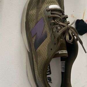New Balance Men’s Olive Green Athletic Shoe with Purple Logo